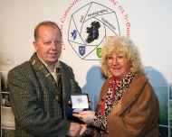 Dominic Reddin, FIPF presenting the Silver Medal to Frances Bailey for Martin Tobin