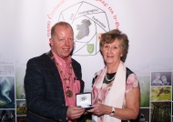 Dominic Reddin, President IPF, presenting Maria O\'Brien with her silver medal in the Intermediate Section of the IPF AV Nationals, 21st October, 2018.