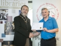 IPF President Michael O'Sullivan presenting 3rd Place Colour Club Award to Limerick Camera Club accepted by Padraic Charlton