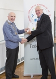 IPF Vice President Sheamus O'Donoghue presenting licentiateship distinction to John Meyler