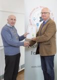 IPF Vice President Sheamus O'Donoghue presenting licentiateship distinction to Mark Overell