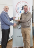 IPF Vice President Sheamus O'Donoghue presenting licentiateship distinction to Terry Hume