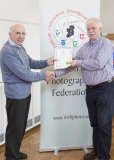 IPF Vice President Sheamus O'Donoghue presenting licentiateship distinction to Tom Cunningham