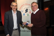 Richard Brown, chairman of the RPS International Jury presenting Raymond Hughes with his historical documentary medal