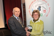 Sheamus O'Donoghue presenting Margaret Finlay with the Audience Vote bronze medal