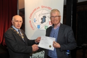 Sheamus O'Donoghue presenting Pat Collins with his Honourable Mention Certificate in the Novice section