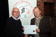 IPF President Dom Reddin presenting an Honourable Mention Certificate to Christopher Doyle