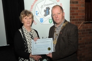 IPF President Dom Reddin presenting an Honourable Mention Certificate to Maria O'Brien