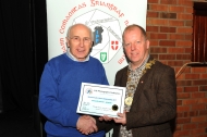 IPF President Dom Reddin presenting Sheamus O'Donoghue with a Honourable Mention Certificate