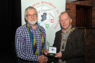 IPF President Dom Reddin presenting a Bronze Medal to Malcolm Imhoff