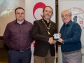 Shane Cowley from Canon Ireland and judge Rikki O'Neill presenting his judge's award medal to Michael O'Sullivan