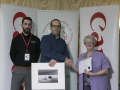 Philip Desmond from Canon Ireland and IPF Vice-President Lilian Webb pictured with award winner Eddie Kelly.jpg